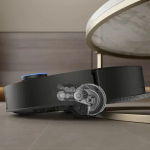 El Dreame X60 Max Ultra en un salón moderno, limpiando junto a una mesa baja